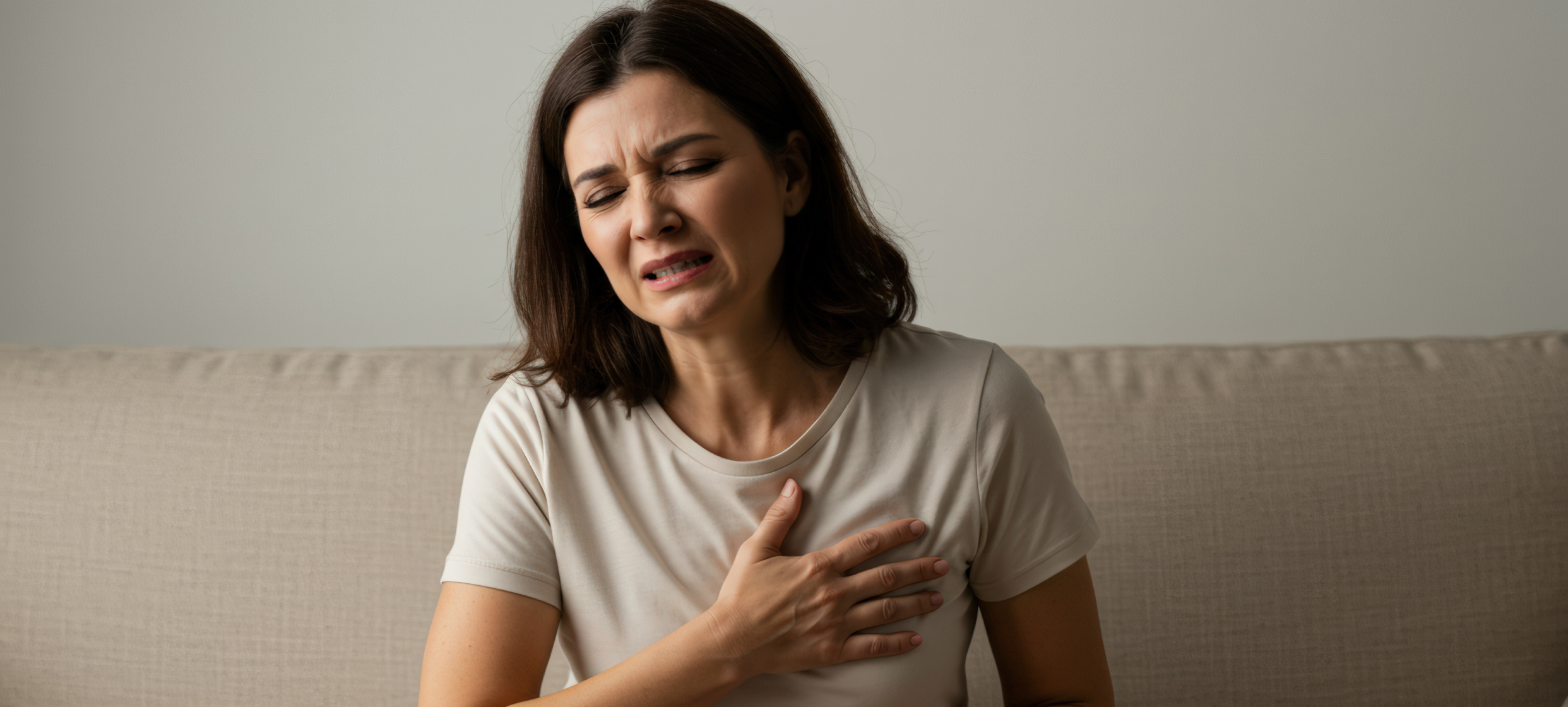 women suffering from heart pain